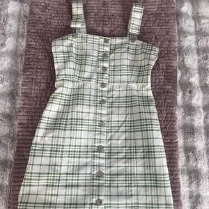 Green and white button front dress